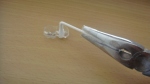 Cotton swab dipped into carbamide peroxide